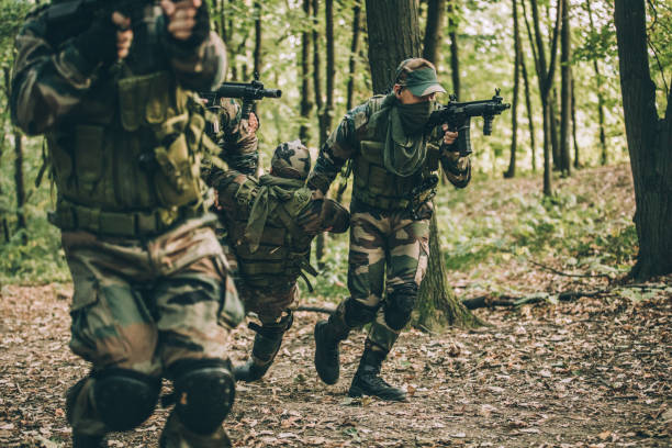 istock Soldiers Carrying Injured Man 1088460998