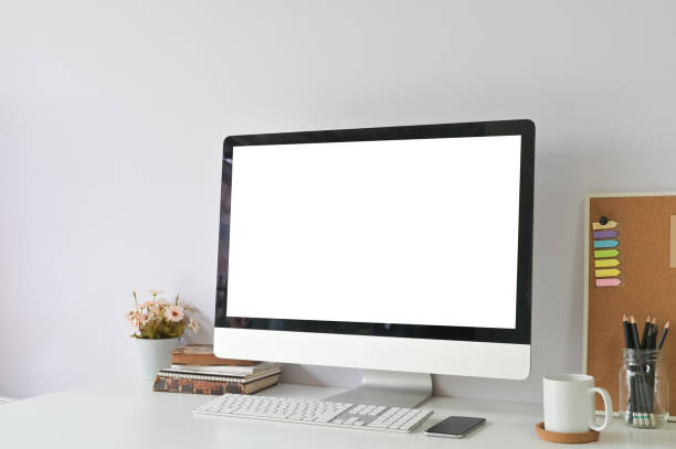 istock Workspace with Mockup laptop computer on office table and office supplies. 1088462652