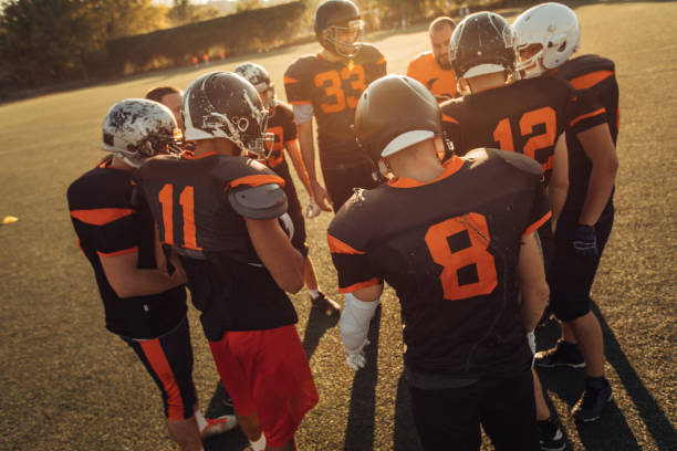 istock Football Players Huddling 1088462800