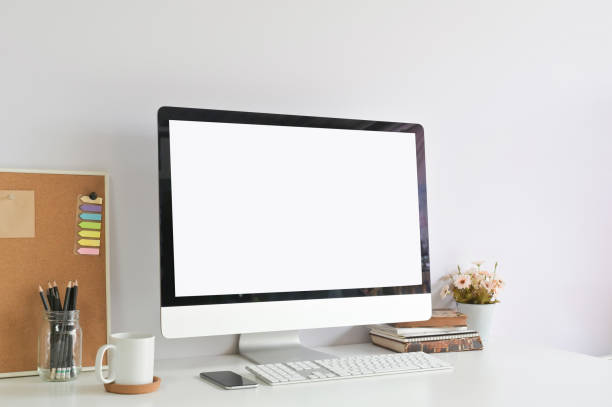 istock Workspace with Mockup laptop computer on office table and office supplies. 1088462876