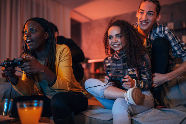istock Group of friends playing video games 1088467270