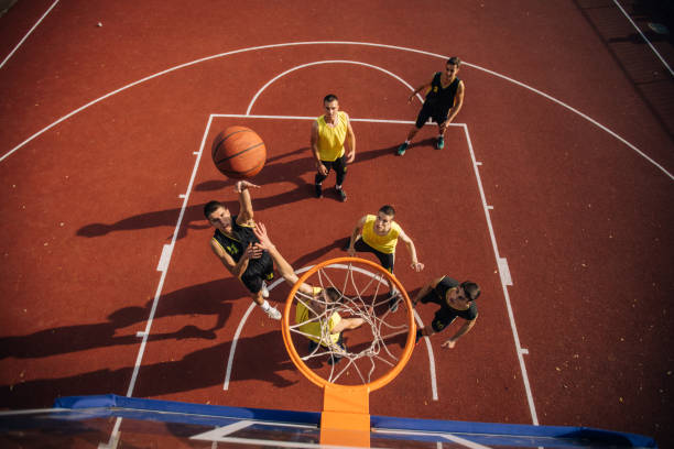 istock Group of players playing basketball 1088473782