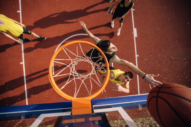 istock Group of players playing basketball 1088476064
