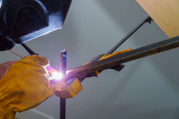 istock A worker with gloves is welding some railings. 1088482814
