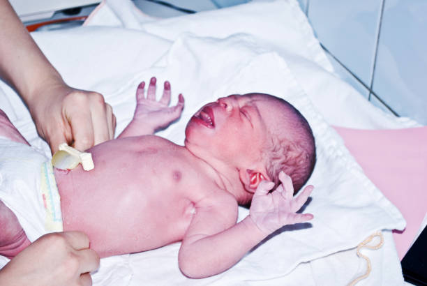 istock New-born baby undergoing first medical examination 1088493806