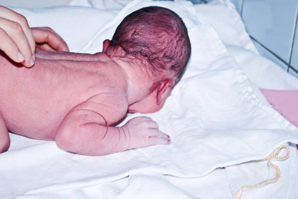 istock New-born baby undergoing first medical examination 1088494032