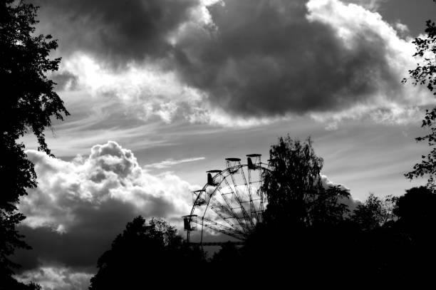 istock Carousel Ferris wheel silhouette, merry-go-round 1088501406