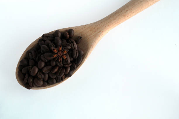 istock Wooden spoon with coffee beans. 1088503154