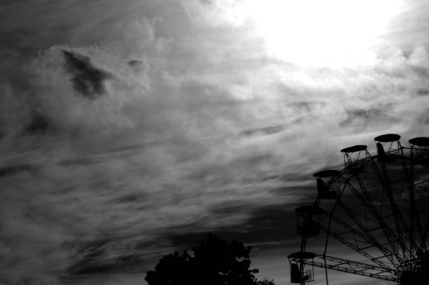 istock Carousel Ferris wheel silhouette, merry-go-round 1088505574