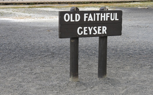 Sign by the roadside at  the Old Faithful Geyser at Yellowstone National Park, Wyoming.