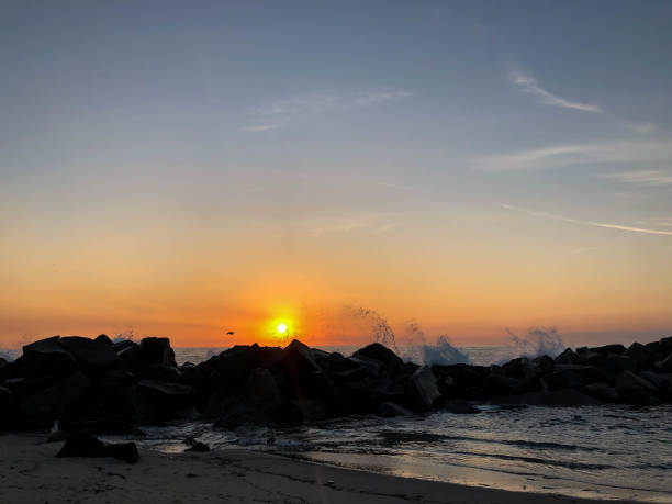 istock Waves crash on the rocks in Venice Beach, CA at sunset 1088510906