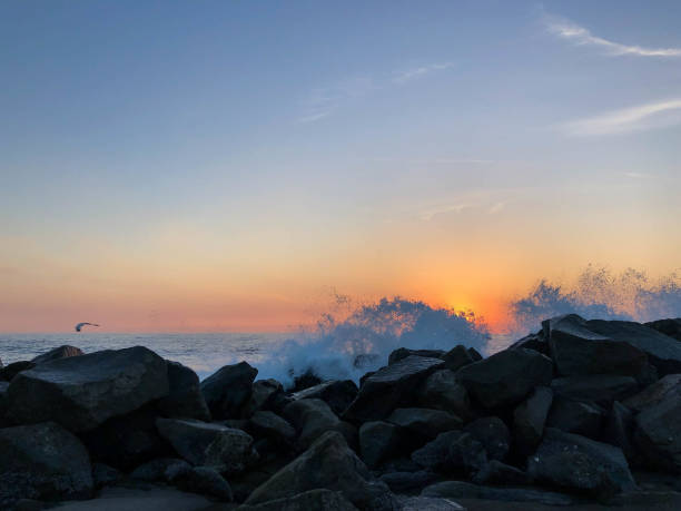 istock Waves crash on the rocks in Venice Beach, CA at sunset 1088510942