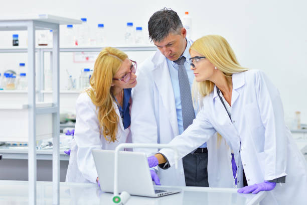 istock group of people working in the laboratory 1088510952