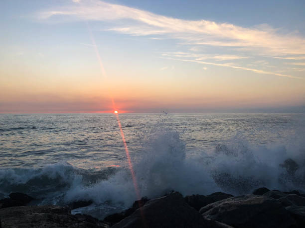 istock Waves crash on the rocks in Venice Beach, CA at sunset 1088511026
