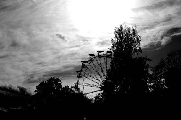 istock Carousel Ferris wheel silhouette, merry-go-round 1088512566