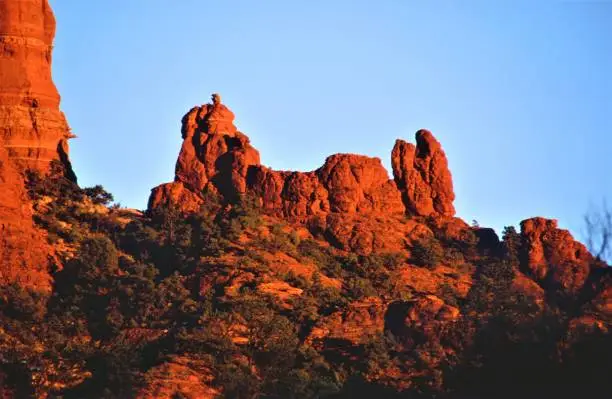 Snoopy Rock at sunset, Sedona, Arizona, U.S.A.  Image of a popular comic strip character.  A dog sleeping on top of his dog house.
