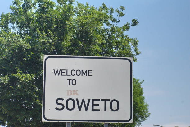 Sign at the entrance to Soweto Sign on the side of the road at the entrance to Soweto, outside Johannesburg, South Africa apartheid sign stock pictures, royalty-free photos & images