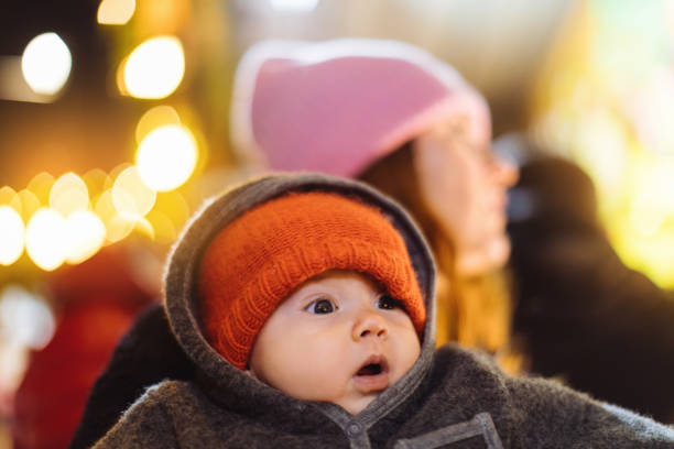 istock Baby impressed with Christmas lights 1088544220