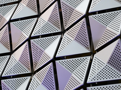silver geometric steel cladding with angular patterns