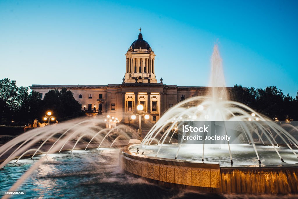 Manitoba Legislative Building, Winnipeg, MB A fountain in front of the Manitoba Legislative Building in Winnipeg, MB. Manitoba Stock Photo