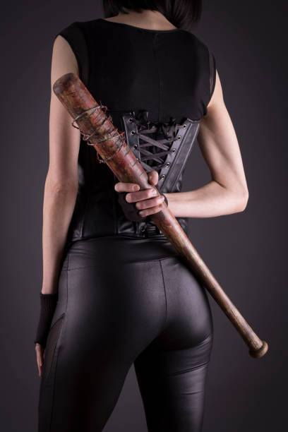 istock Sexy female assassin with a bat 1088548358