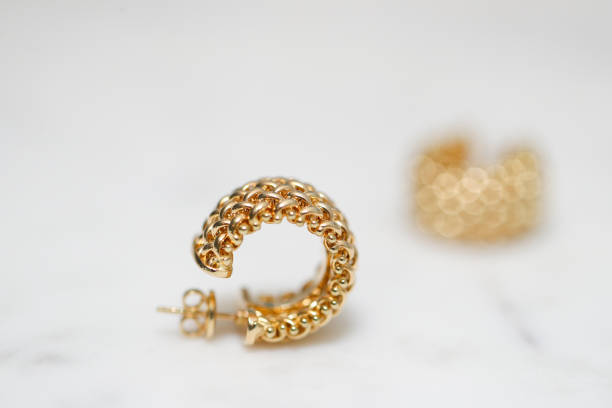 istock yellow gold hoop earrings 1088551436