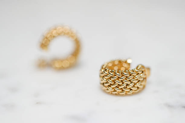 istock yellow gold hoop earrings 1088551438