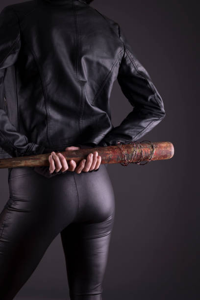 istock Sexy female assassin with a bat 1088551460
