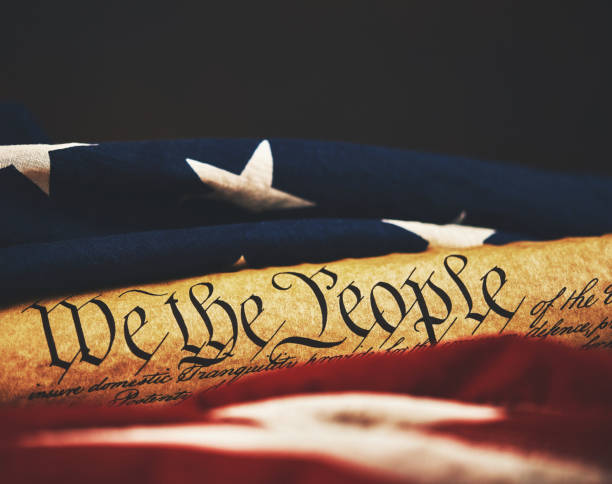 United States Constitution with American Flag