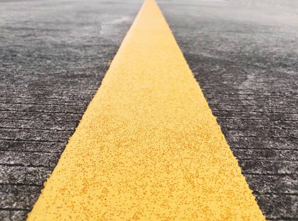 istock Yellow line of cement street. 1088557036