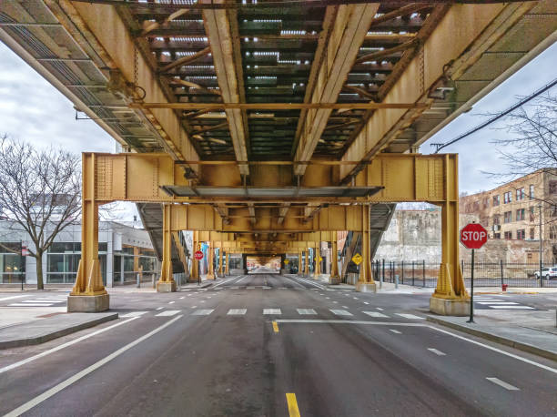 Lake Street underneath the elevated train in the Fulton Market West Loop neighborhood. Main streets in Chicago, streets in Illinois. stock photo