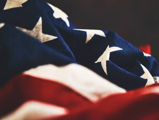istock American flag against brown background 1088582002