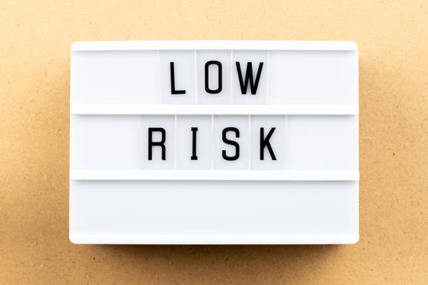 istock Light box with word low risk on wood background 1088584810