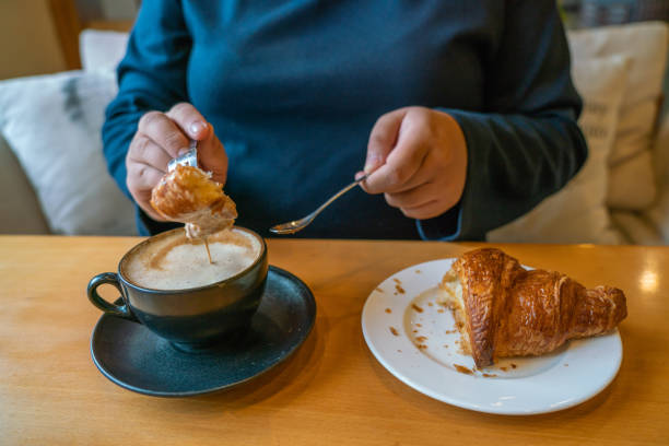 istock Delicious breakfast with hot Cappuccino and croissant 1088596794