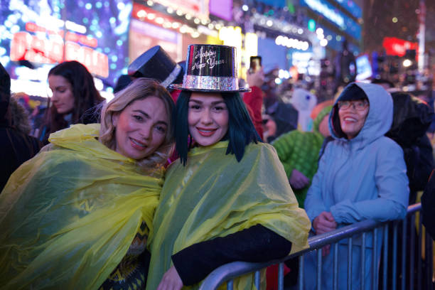 New Year's Eve, Times Square, New York City A huge crowd gathered to celebrate the New Year despite the rainy weather. new years eve new york stock pictures, royalty-free photos & images