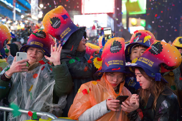 New Year's Eve, Times Square, New York City A huge crowd gathered to celebrate the New Year despite the rainy weather. times square new years eve stock pictures, royalty-free photos & images