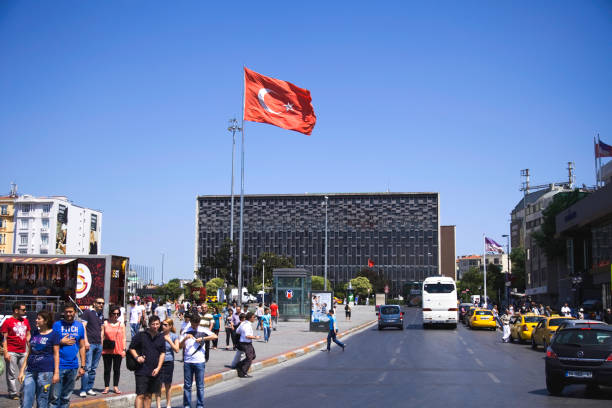 Istanbul, Turkey- July 10,2011: Ataturk Cultural Center is in Istanbul, also simply called AKM. As the focal point of Taksim Square, it is not only a multi-purpose cultural center and opera house, but an icon of Istanbul. The AKM is considered an important example of Turkish architecture from the 1960s.Two Turkish architects, Feridun Kip and Ruknettin Guney, proposed the building of the center on May 29, 1946, and work began on the building's foundation until funding was halted in 1953. In 1956, construction resumed with Hayati Tabanlıoğlu as the architect.