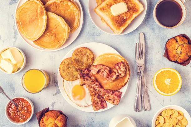 istock Healthy Full American Breakfast with Eggs Bacon Pancakes and Latkes 1088636950