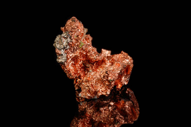 istock Macro mineral stone Copper on black background 1088658424