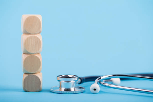 istock Stethoscope With Four Wooden Blocks 1088665742
