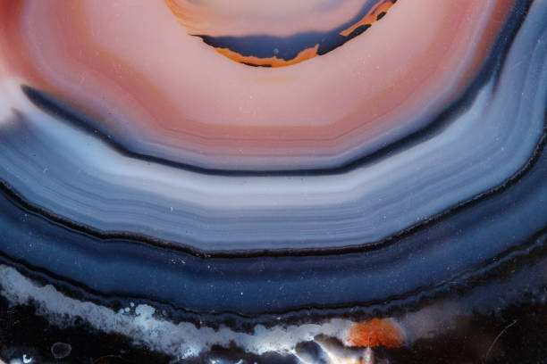istock Macro mineral stone Yellow, brown Agate breed a white background 1088672500