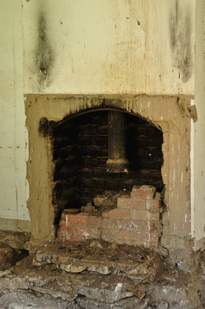 istock A fireplace in an old abandoned house 1088675900