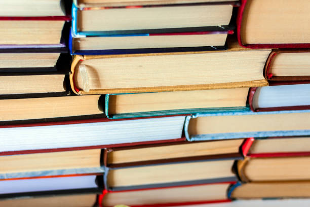 istock Stack of books education concept background, many books piles . 1088675916