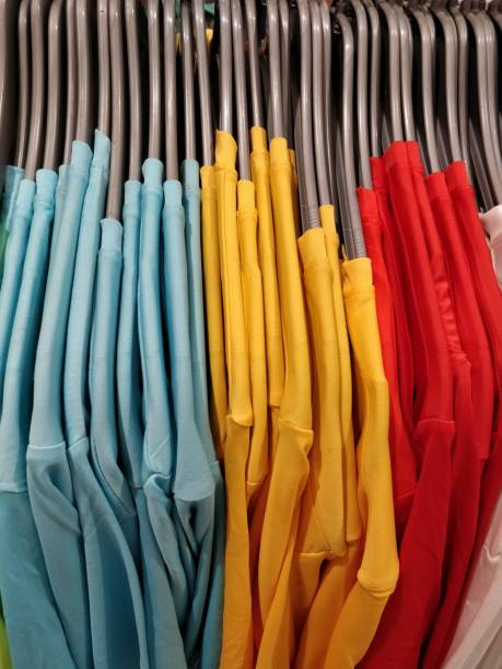 istock Row of shirts hanging on rack 1088676068
