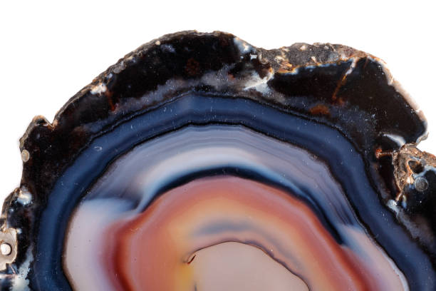 istock Macro mineral stone Yellow, brown Agate breed a white background 1088676448