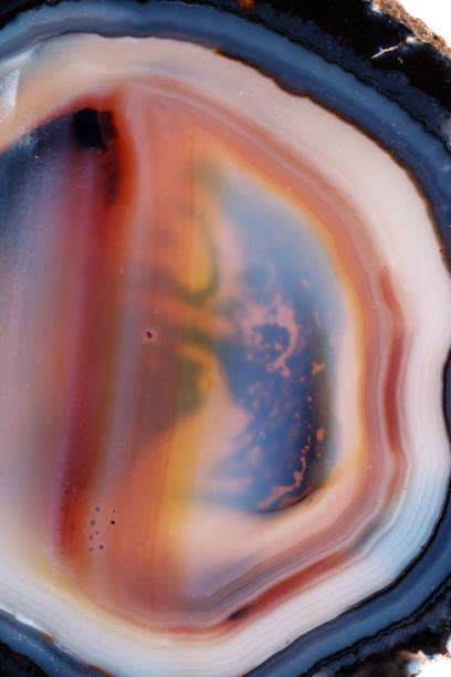 istock Macro mineral stone Yellow, brown Agate breed a white background 1088677590