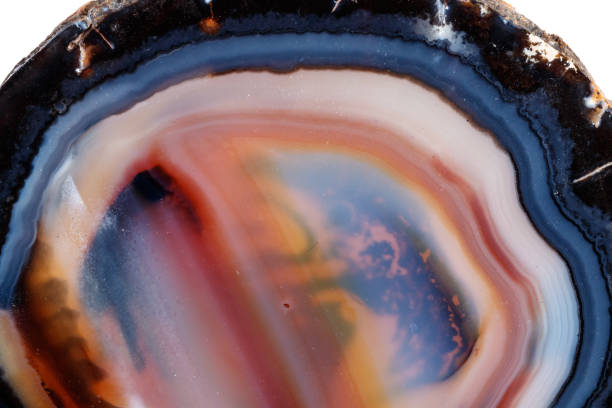 istock Macro mineral stone Yellow, brown Agate breed a white background 1088678674