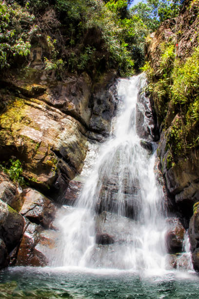 istock cascading waterfall over the rocks in Puerto Rico 1088680878