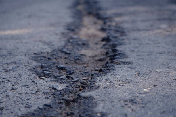 istock cracked asphalt after earthquake 1088684176