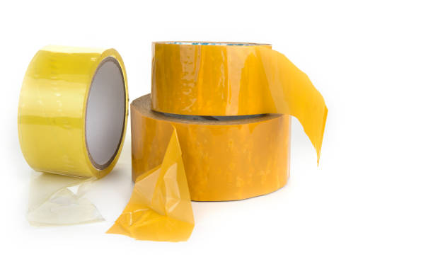 istock Three rolls of scotch tape on a white 1088690244